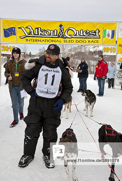 4 time consecutive Yukon Quest and Iditarod champion Lance Mackey after coming in second  finish line  Yukon Quest 1  000-mile International Sled Dog Race 2010  Whitehorse  Yukon Territory  Canada