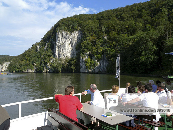 People on the deck of a passenger ship  gap of danube river  near Weltenburg  Altmuehltal Nature Park  Bavaria  Germany  Europe