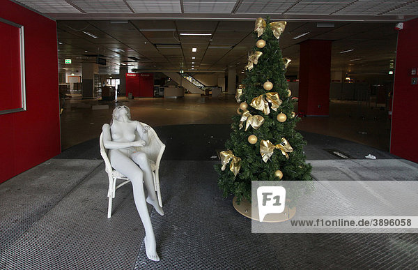 Bizarre Christmas decoration in a closed department store during the economic crisis