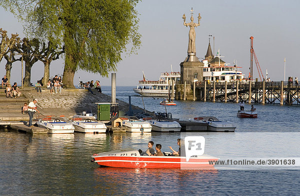 Pedal boats in the harbor  boat rental  Imperia statue  harbor entrance  Konstanz  Baden-Wuerttemberg  Germany  Europe