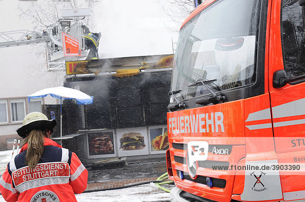 Rescue service and fire brigade extinguishing a fire  Stuttgart  Baden-Wuerttemberg  Germany  Europe