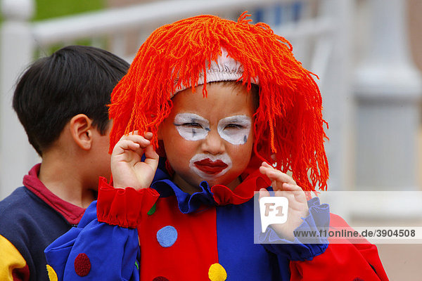 Boy dressed up as a clown  Mapuche Indians  Temuco  southern Chile  Chile  South America