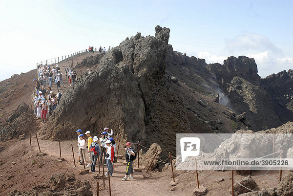 Tourists at the crater of Vesuvius  Italy  Europe