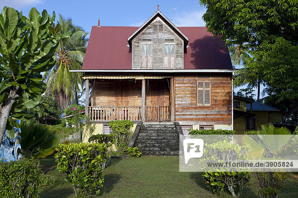 Wooden house by Eustache Sarde  built in the early 20th century  protected because of the typical construction  La Digue Island  Seychelles  Africa  Indian Ocean