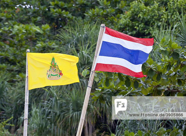 National flag and the royal flag of Thailand  Phuket Island  Southern Thailand  Thailand  Southeast Asia  Asia
