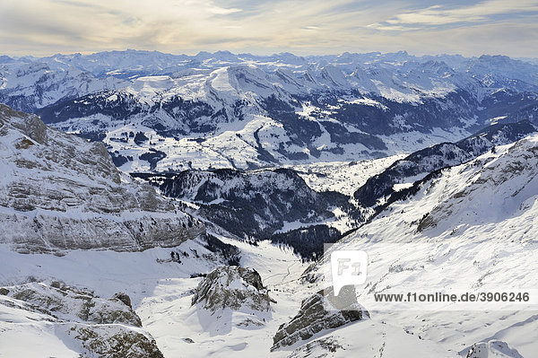 View from Mt Saentis of the wintery Thur Valley  Grisons Alps in the back  Canton of Appenzell Ausserrhoden  Switzerland  Europe