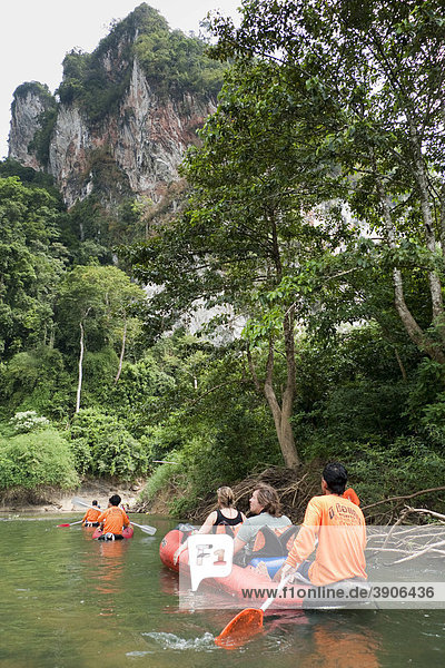 Tourists canoeing  Khlong Phanom National Park  Thailand  Asia