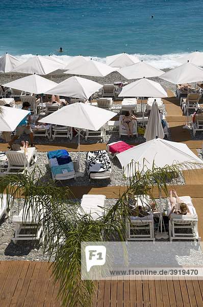Sun umbrellas on the beach  Nice  Cote d'Azur  Provence  France  Europe