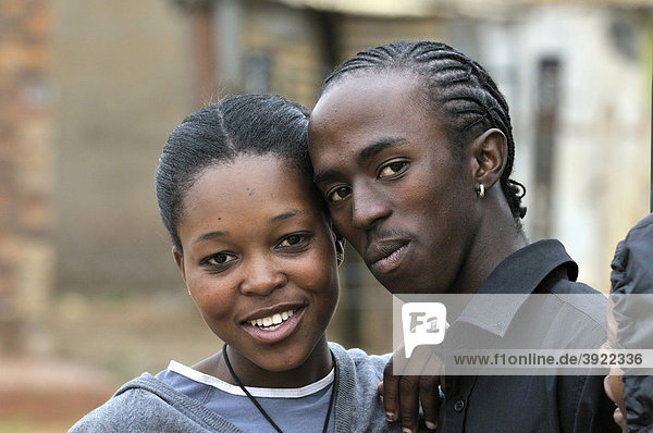 Teenager pair  loveLife Youth Centre  slum  Orangefarm Township  Johannesburg  South Africa  Africa