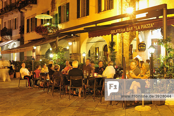 Promenade with street restaurant  Lago Maggiore lake  Cannobio  Piedmont  Italy  Europe