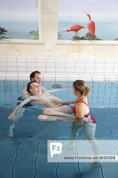 Individual therapy in a heated pool  physical therapy in a neurological rehabilitation centre  Bonn  North Rhine-Westphalia  Germany  Europe