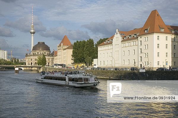 River Spree with Bode Museum  Fernsehturm TV tower and tourist boat  Berlin  Germany  Europe