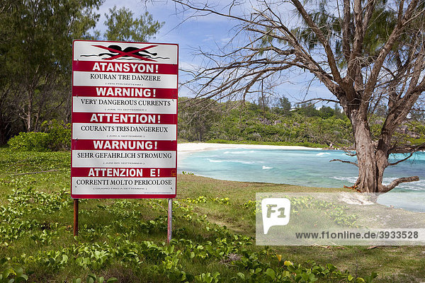 Warning sign  dangerous currents  Anse Cocos  La Digue island  Seychelles  Africa  Indian Ocean