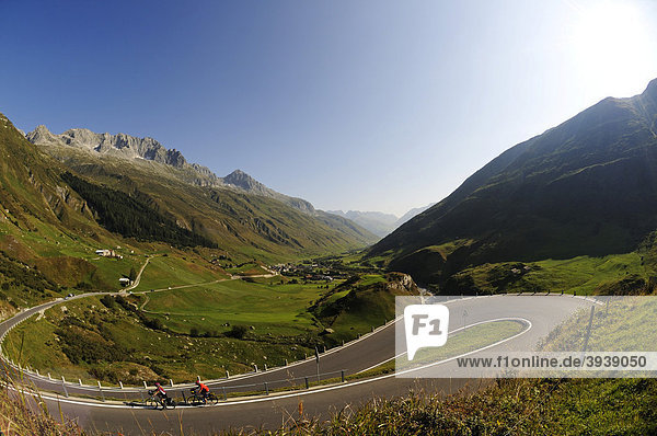 Cyclists on Furka Pass  Uri  Switzerland  Europe