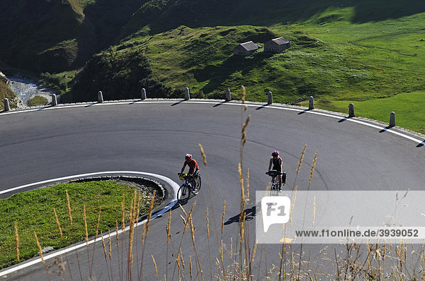 Cyclists on Furka Pass  Uri  Switzerland  Europe