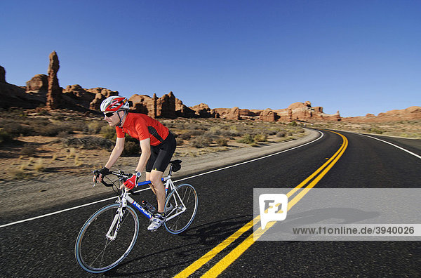 Race cyclist  Arches National Park  Moab  Utah  USA