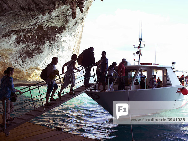 Tourists in the Bue Marino grotto on Cala Golone  Gulf of Orosei  west Sardinia  Italy  Europe