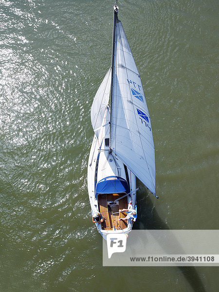 Topview of a yacht with an older couple