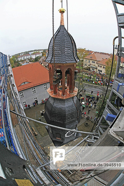 Spire is lifted onto the roof of the Luebbener Schloss castle after renovation work  Luebben  Brandenburg  Germany  Europe