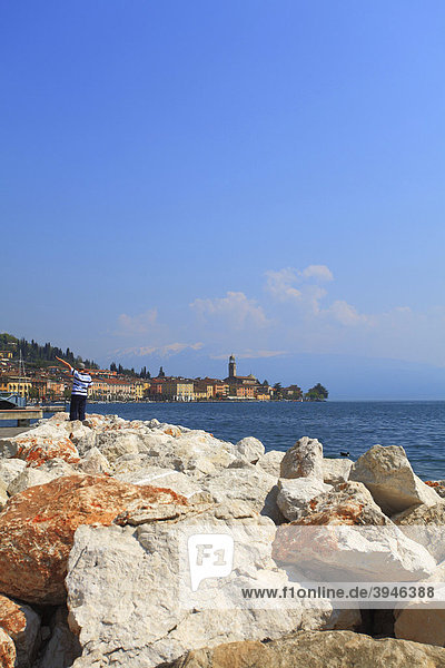 Rocks looking towards SalÚ on Lake Garda Italy Europe