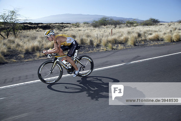 The German professional triathlete Jan Raphael on the bike course of Ironman Triathlon World Championship in Kona  Hawaii  USA