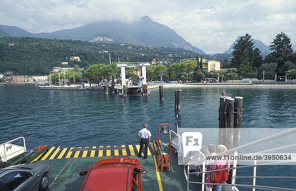 Car ferry docking at the pier in Toscolano Maderno  ferry  boat  Lake Garda  Italy  Europe