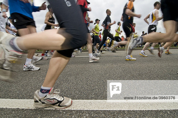 Marathon runners with motion blur
