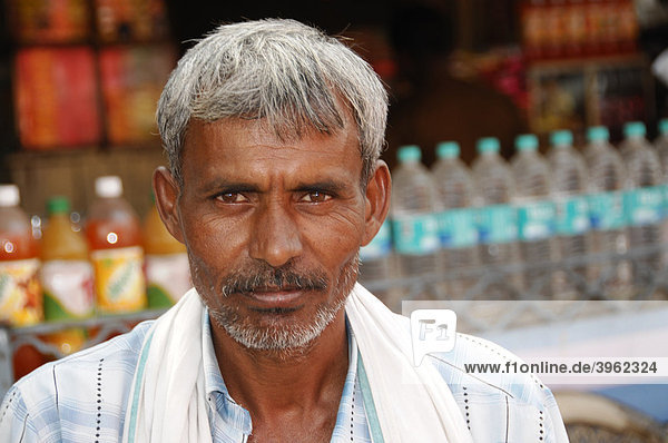 Indian man  drink vendor  Sawai Madhopur  Rajasthan  North India  Asia