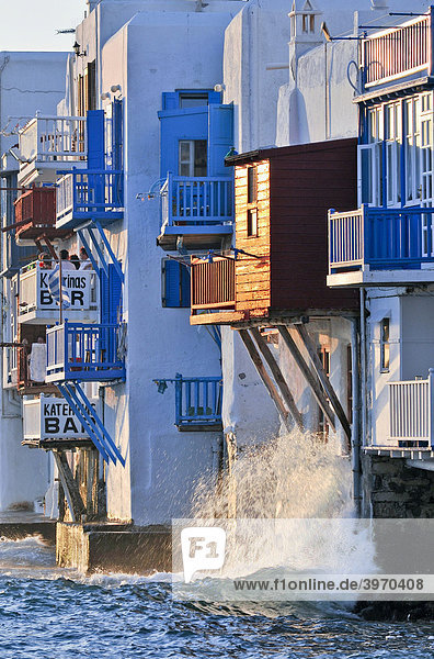 House facades at the ocean  colored wooden balconies Little Venice  Mykonos  Cyclades  Greece  Europe