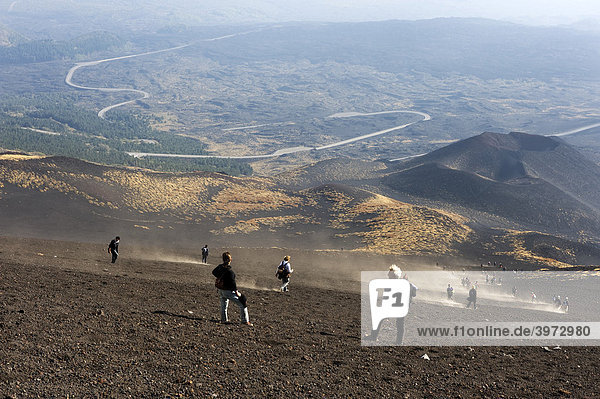 Tourists descending from Mount Etna  Sicily  Italy
