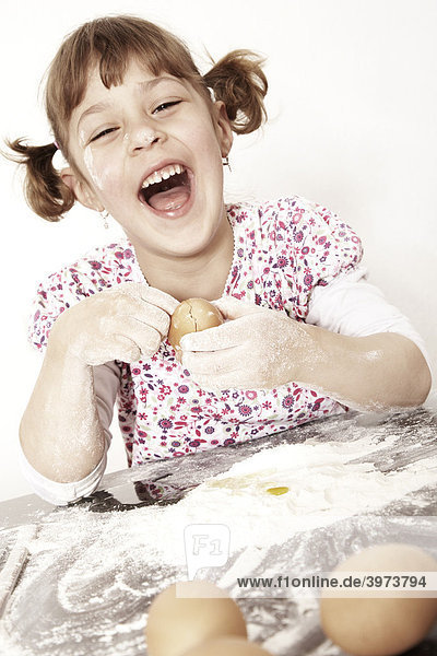 Six-year-old girl baking