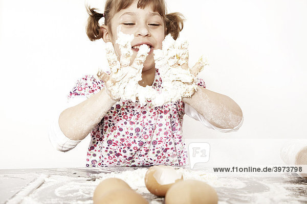 Six-year-old girl baking