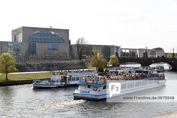 Excursion boats on the Spree River in front of the Moltkebruecke Bridge at the Federal Chancellery  Berlin  Germany  Europe