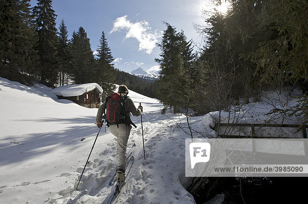 Woman on a skiing tour near Valdurna  Durnholz  Sarn Valley  Alto Adige  Italy  Europe
