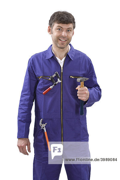 Handwerker im Blaumann mit Werkzeug