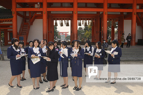 Japanese travel guides  hostesses  being trained in the Heian Shrine in Kyoto  Japan  Asia