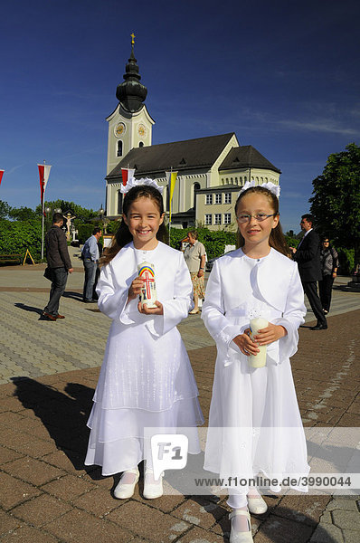 First Communion  girls in front of a church  Wals  Salzburg state  Austria  Europe