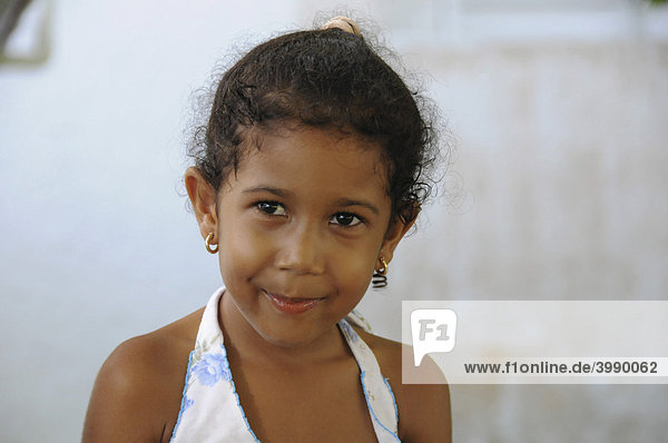 Creole girl  smiling  portrait  Seychelles  Africa  Indian Ocean