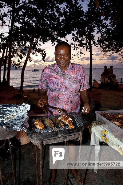 Market salesman  Creole Market  Beau Vallon Bay  Mahe Island  Seychelles  Indian Ocean  Africa