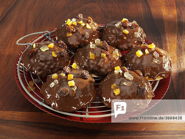 Chocolate gingerbread coated with dark chocolate and decorated with bits of candied orange peel and lemon peel