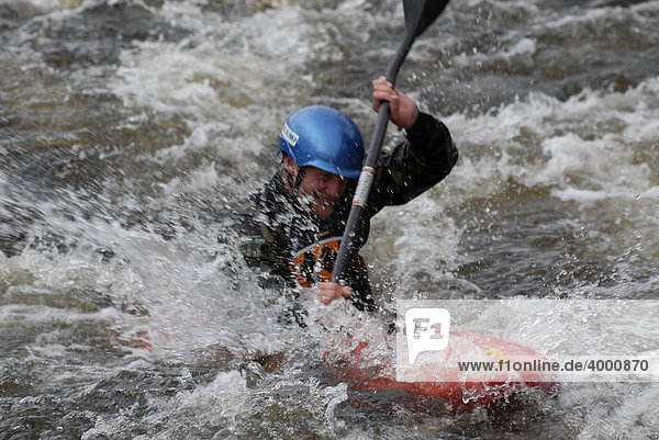 Kayaker at a white water race  Glen Etive River Race  Glen Etive  Scotland  Great Britain  Europe