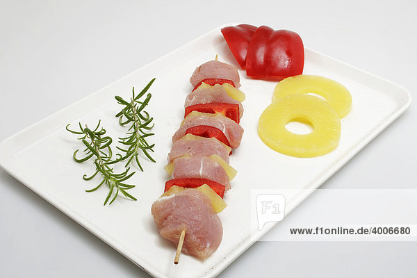 Turkey breast meat skewer with bell peppers and pineapple with ingredients