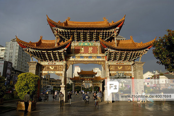 Two Chinese gates  pedestrian zone in the city center  Jinmabiji square  Kunming  Yunnan Province  People's Republic of China  Asia