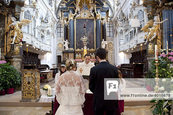 Bride and groom at their wedding in the Basilica of St. Emeran in Regensburg  Bavaria  Germany  Europe