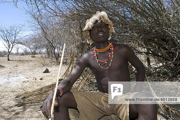 Member of the Hadzabe tribe with a hunting arrow  Lake Eyasi  Tanzania  Africa