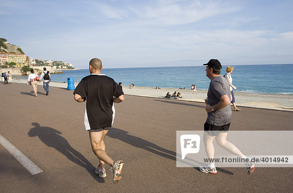 Men jogging on Promenade des Anglais  beach  Nice  Cote d'Azur  France