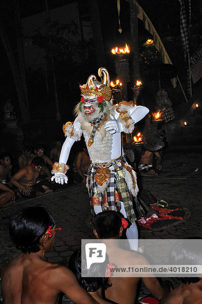 Masked dancer performing Kecak  Ketjak or Ketiak Dance in Ubud  Bali  Indonesia  Asia