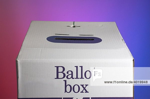 Ballot box against backdrop with opposing colours of the political spectrum