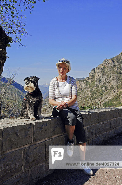Woman with Miniature Schnauzer dog  Gorges de Daluis  Alpes-Maritimes  Provence-Alpes-Cote d'Azur  Southern France  France  Europe  France  Europe