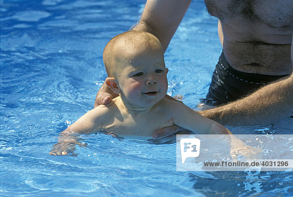 Lucas  boy  9 month old  in a swimming pool